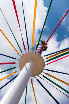 Traditional English maypole and coloured ribbons