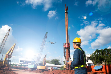 Drones are operated by construction workers on construction sites on large scale jobs.