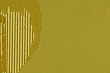 A yellow vintage rough sheet of carton. Recycled environmentally friendly cardboard paper texture. Simple and bright minimalist papercraft background.
