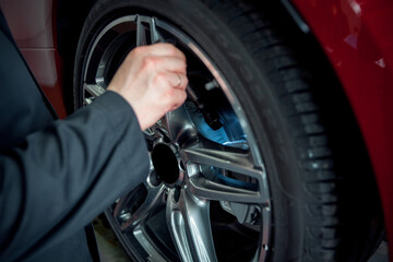 changing the wheel of a car service