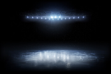 Background. Beautiful empty winter background and empty ice rink with lights. Spotlight shines on...