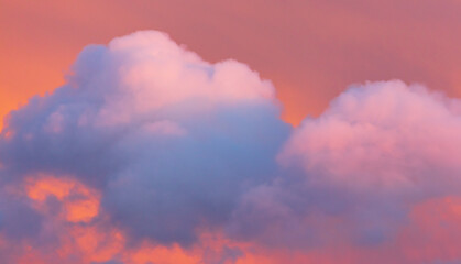Colorful clouds at sunset as background.