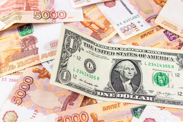 Fototapeta na wymiar background of rubles and dollars