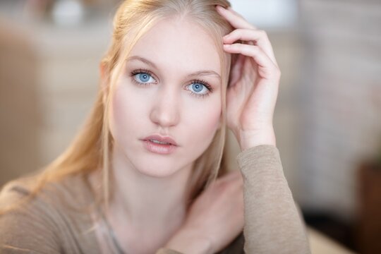 Portrait of natural beauty nordic woman with innocent blue eyes.