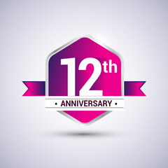 Logo 12th anniversary celebration isolated in red hexagon shape and red ribbon colored, vector design.