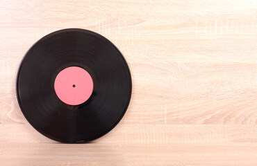 Obraz premium Vintage vinyl discs on wooden background
