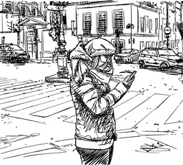 Casual girl in warm winter clothes stands in city on street at intersection and uses smartphone. Cityscape vector sketch, Paris hand drawn illustration
