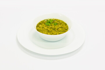 white bowl of vegetable soup