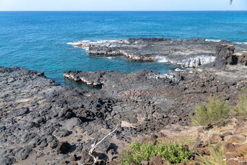 Fototapeta na wymiar Spouting Horn tourist site in Kauai, Hawaii