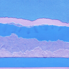 Blue and violet torn paper collage close-up. Texture made from various paper and cardboard parts. Damaged old paper background. Vintage blank wallpaper. Material design backdrop.