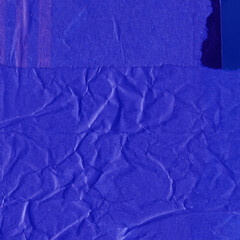 Blue and violet torn paper collage close-up. Texture made from various paper and cardboard parts. Damaged old paper background. Vintage blank wallpaper. Material design backdrop.