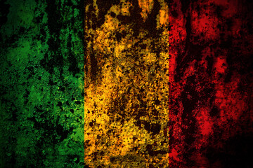 Mali flag on grunge metal background texture with scratches and cracks