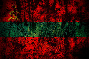 Transnistria flag on grunge metal background texture with scratches and cracks