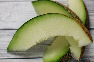 BEAUTIFUL MELON ON A GRAY BACKGROUND
