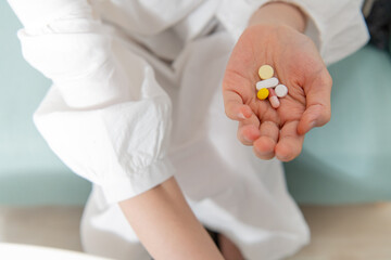 Pill in palm of hand, Medicine, health care and people concept