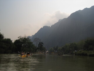 Traveling down the Mekong River and through the jungle landscapes of Laos in Southeast Asia