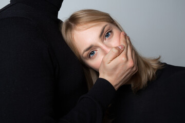 beautiful young female subject to domestic violence by a man