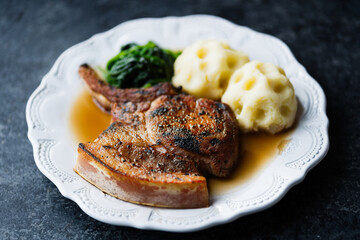 rustic golden  caramelized pork chop