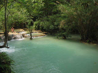 Backpacking through the waterfalls and jungles down the Mekong River in Laos, Southeast Asia