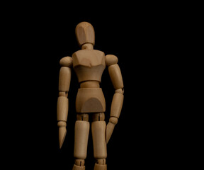Wooden man on a dark background