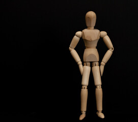 Wooden man on a dark background
