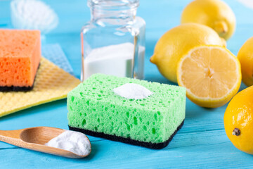Eco friendly home cleaning, homemade recipe. Soda, lemon, salt. Zero waste detergent on blue background