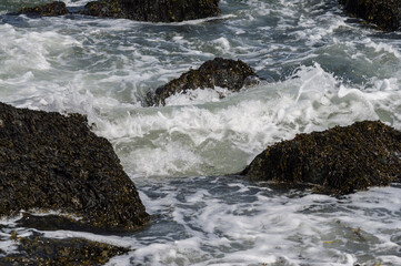waves crashing on rocks