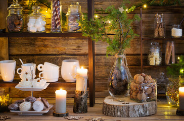 Christmas decoration cocoa bar with cookies and sweets on old wooden background in  natural rustic style. Winter cozy concept
