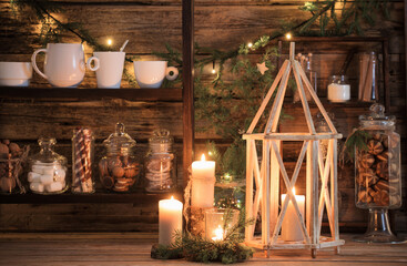 Christmas decoration cocoa bar with cookies and sweets on old wooden background in  natural rustic style. Winter cozy concept