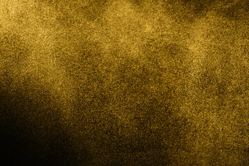 Gold dust texture on black background