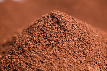 macro of coffee with brown background