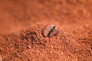 macro of coffee with brown background