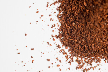 coffee powder (ground coffee), white background.