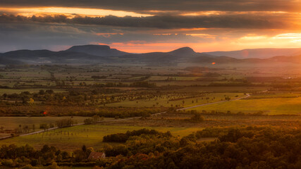 Sunset over the Káli Basin with the volcanic origin hills of the Balaton Uplands during the autumn...