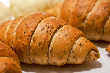Close-up of a whole roasting pan of French croissant