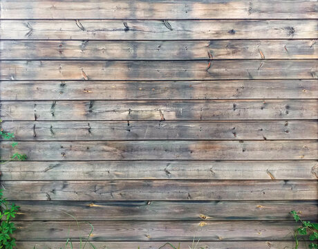Wall background of horizontal old wooden slats in natural state. Exterior wall or fence of wooden planks. Detail of Caribbean architecture, tropical construction. Wood background.