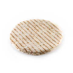 Grilled round tortillas on an isolated background
