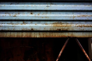 old rusty and white metal fence background
