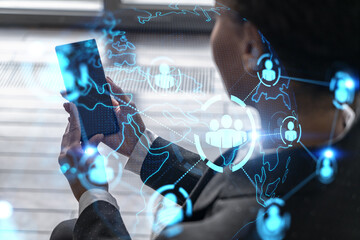 Businesswoman using phone, work in modern office on new project. Double exposure. Concept of success. Social network hologram.