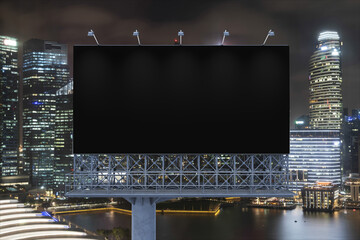 Blank black road billboard with Singapore cityscape background at night time. Street advertising poster, mock up, 3D rendering. Front view. The concept of marketing communication to sell idea.