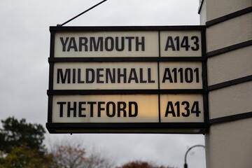 Fototapeta premium Destinations on a road sign in Bury St. Edmunds, Suffolk