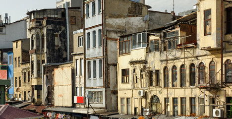 Fototapeta na wymiar Dilapidated houses in the Karakoy neighborhood. Istanbul, Turkey.