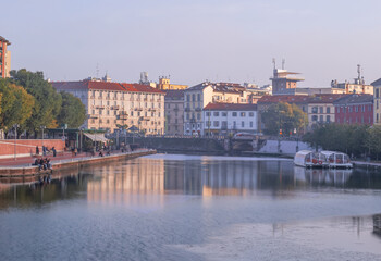 Fototapeta na wymiar View of Darsena,the wet dock in Navigli Neighborhood.Milan,Lombardy,Italy