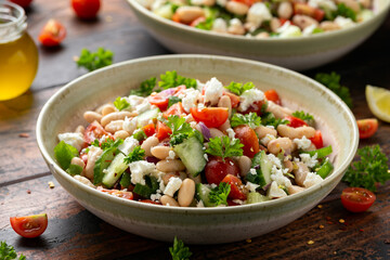 Bean Salad with Cherry Tomatoes, Cucumber, Red onion, Feta cheese and parsley. Healthy vegetarian,...