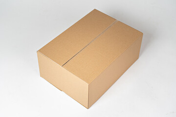 Brown carton box on a white background