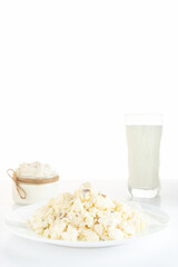 Various dairy products on a white background. Homemade milk and cheese. Isolate.