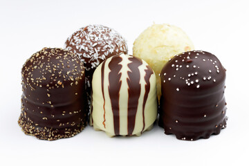 different chocolate marshmallows on white background 