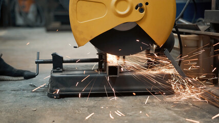Sawing with a circular saw metal, many sparks. Safety violation