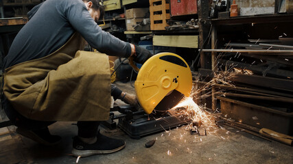 Sawing with a circular saw metal, many sparks. Safety violation