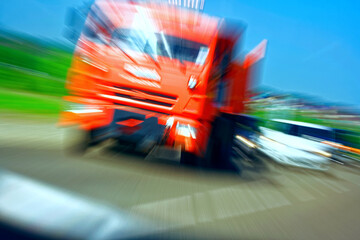 Truck with red cab on the road in motion. Accident rate. View from the cab of the car
